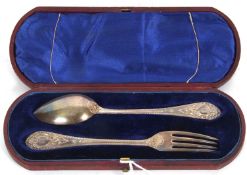 Cased pair of Victorian christening fork and spoon with feather edged and cartouche embossed