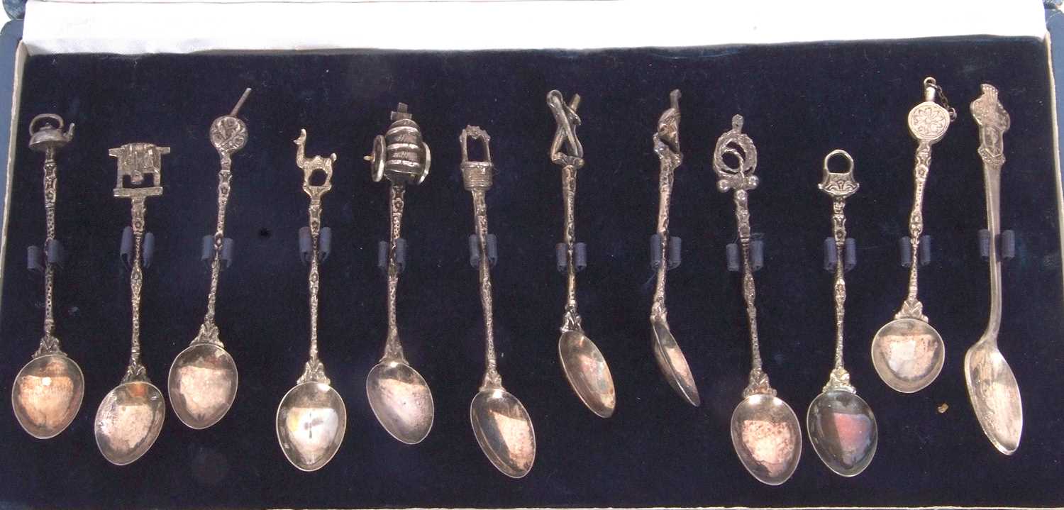 A cased set of eleven (of twelve) Spanish silver decorative coffee spoons with cast stems and - Image 2 of 5
