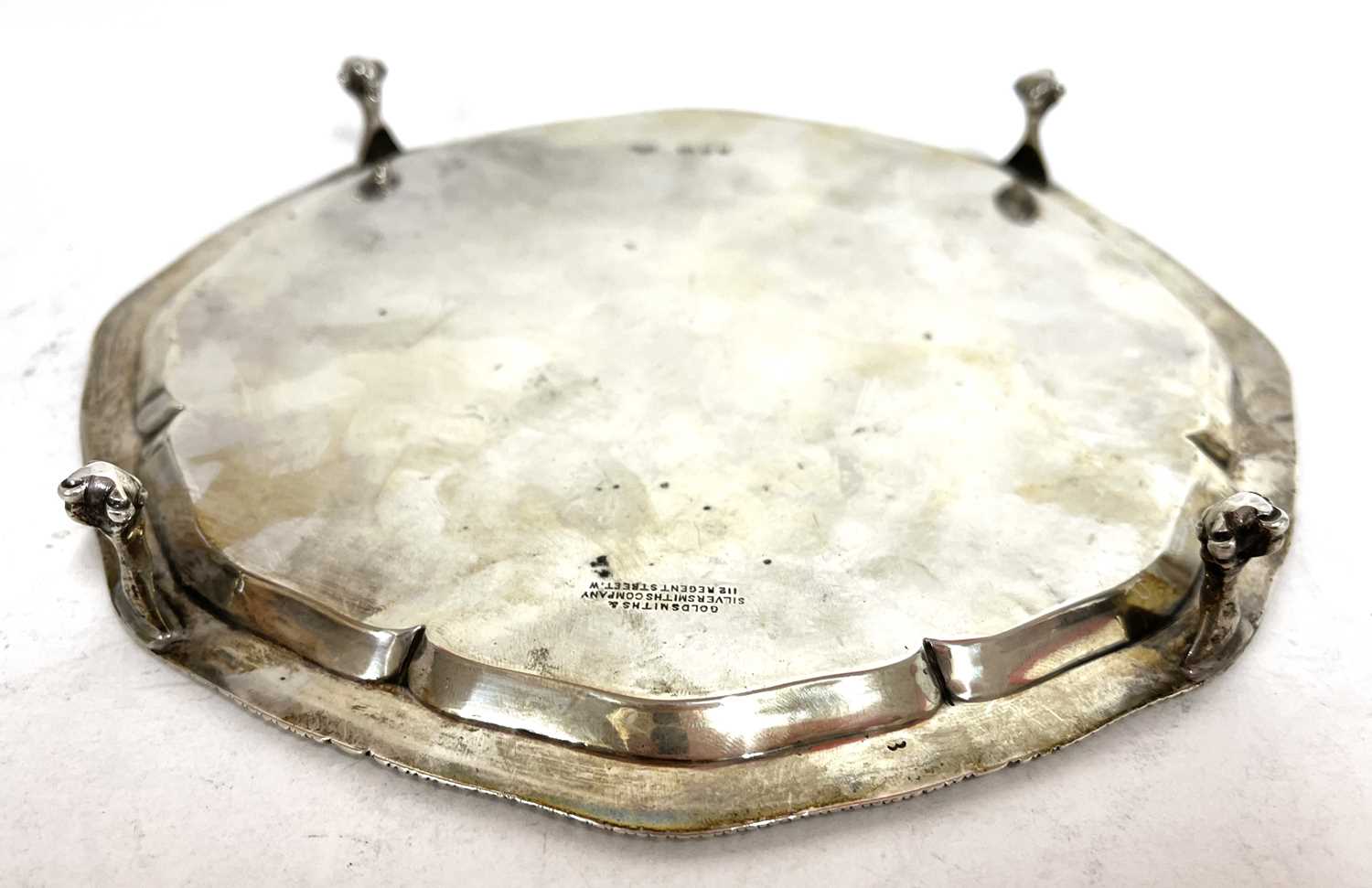 George V silver salver, the scalloped rim with gadrooned border supported on four claw and ball - Image 4 of 5