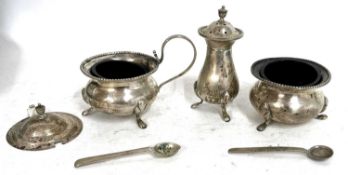 Cased condiment set comprising lidded mustard (a/f) pepper, open salt and two condiment spoons, each