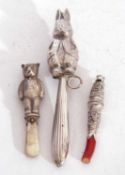 Mixed lot to include a vintage continental white metal baby rattle in the form of Peter Rabbit, a
