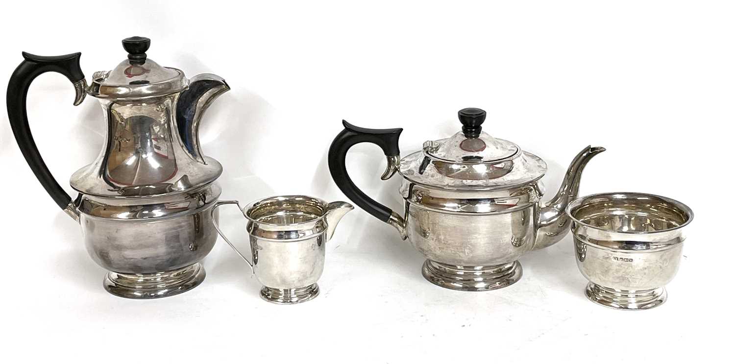 George VI silver four piece tea set comprising teapot, hot water jug, cream jug and bowl, hallmarked