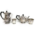 George VI silver four piece tea set comprising teapot, hot water jug, cream jug and bowl, hallmarked