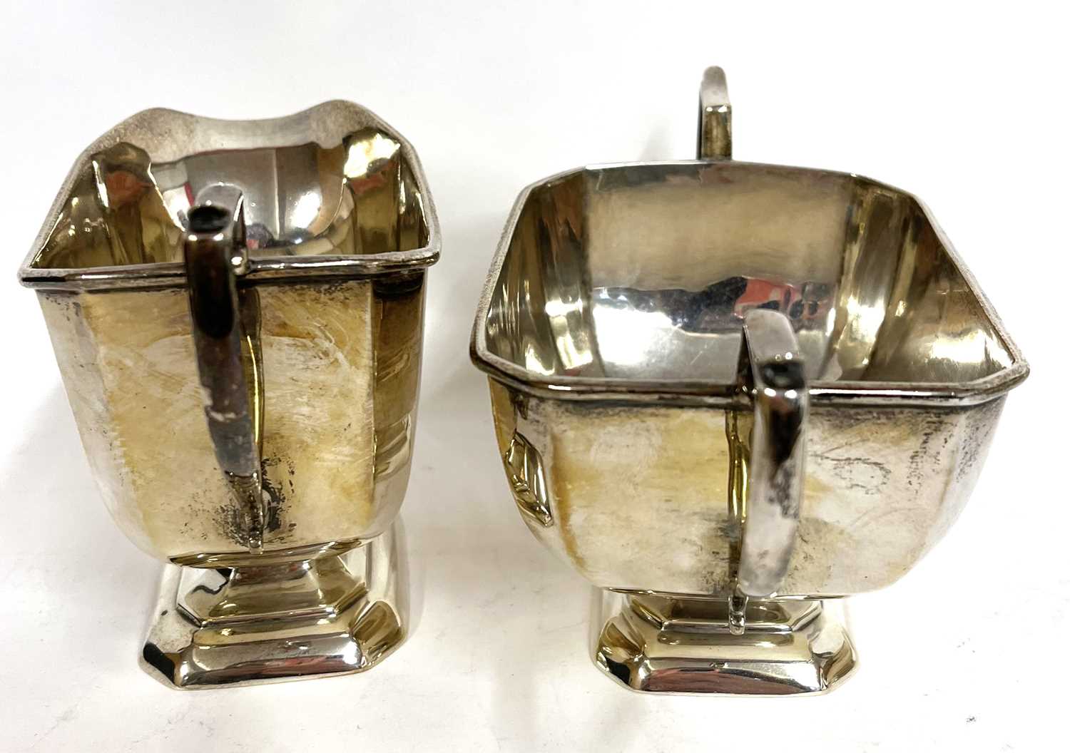 Art Deco silver three piece tea set of plain panelled form comprising teapot, sugar bowl and cream - Image 8 of 9