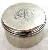 George III round silver box with pull off cover engraved with initials, London 1765, makers mark E.