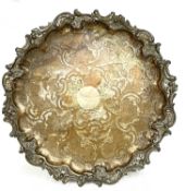 Georgian silver plated on copper tray of shaped circular form with applied cast scroll border, the