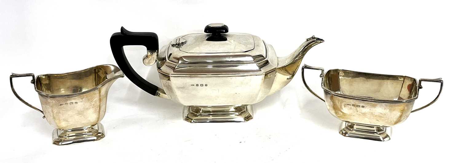 Art Deco silver three piece tea set of plain panelled form comprising teapot, sugar bowl and cream