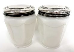 Pair of vintage silver screw top milk glass oatine cream jars of hexagonal form, the screw on lids