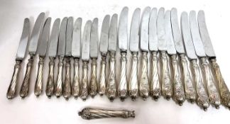 Eleven German 800 marked handle table knives (one with one handle only) together with ten matching