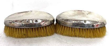 Pair of hallmarked silver backed clothes brushes, Birmingham 1922, makers mark for William Neale &