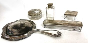 Group of silver mounted dressing table items including a hand mirror, two glass boxes and two jars