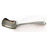 Georgian silver long handled caddy spoon, circa 1824, the shovel shaped bowl to a bright cut handle,