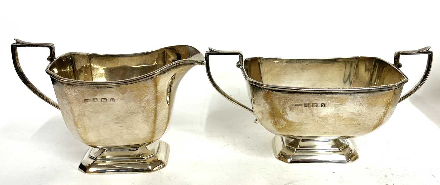 Art Deco silver three piece tea set of plain panelled form comprising teapot, sugar bowl and cream - Image 7 of 9