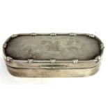 Edwardian silver trinket box of shaped rectangular form, applied with a bow and reeded border to