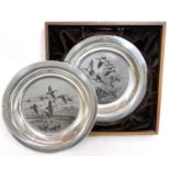 Two silver limited edition plates, 'The Peter Scott Christmas Plates', etched from the original work