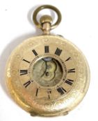 Yellow metal pocket watch stamped in the case K14, in the front and the back, the pocket watch is