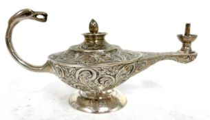 Edwardian silver novelty genie oil lamp with eagles head handle, a flame reservoir finial,