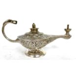 Edwardian silver novelty genie oil lamp with eagles head handle, a flame reservoir finial,