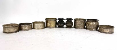 Mixed lot to include seven hallmarked silver serviette rings, various dates and makers together with