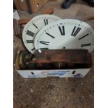 One box of various clock parts to include a range of clock faces