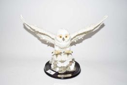 Modern model of a snowy owl