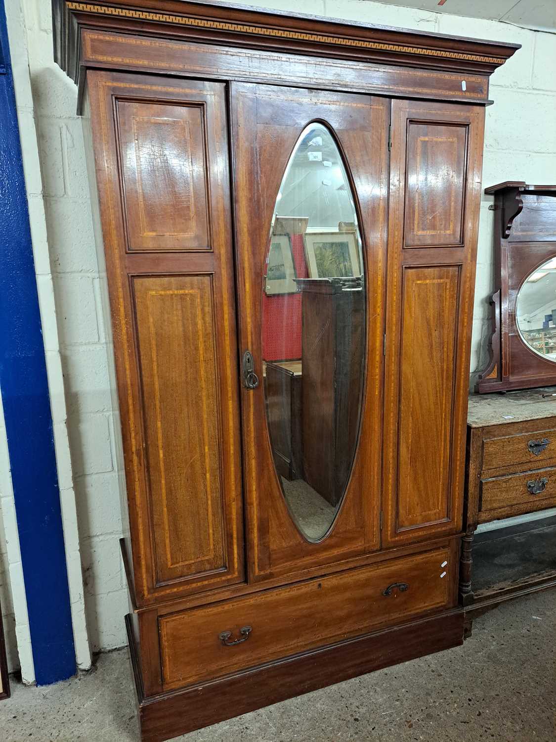 Edwardian wardrobe with oval mirrored door