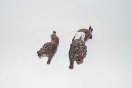 Two Oriental carved hardwood model lions