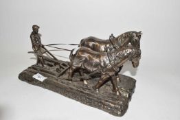 Bronzed resin model of horses ploughing