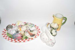 Collection of various ceramic eggs, meat plate decorated with chickens and other items