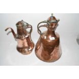 Two Middle Eastern copper jugs or kettles