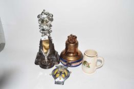 Mixed Lot: Vintage AA badge, a vintage ceramic Whiskey bell, trophy and a further mug