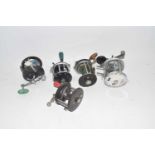 Mixed Lot: Five various centre pin multiplier fishing reels to include Mitchell 624, Penn and