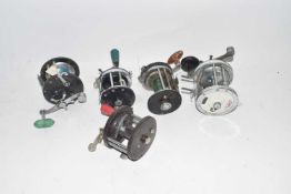 Mixed Lot: Five various centre pin multiplier fishing reels to include Mitchell 624, Penn and