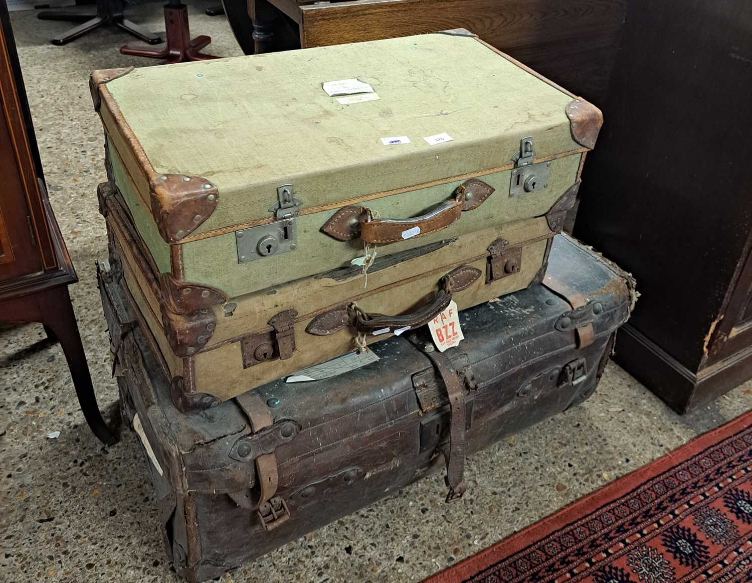 Three vintage suitcases