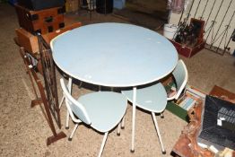 Circular blue melamine topped retro table and four accompanying chairs