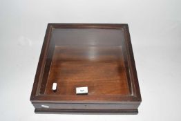 Small wedge formed table top display cabinet