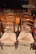 Set of four rush seated ladder back kitchen chairs