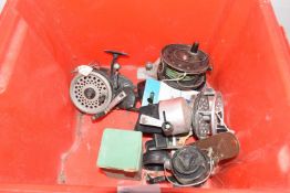 Mixed Lot: Various centre pin and fixed spool reels to include Shakespeare, Intrepid and others