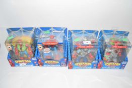 Four boxed Spiderman figures