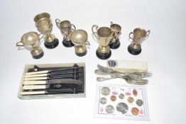 Mixed Lot: Various small silver plated trophies, cutlery, modern British cased coin set etc