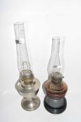 Mixed Lot: Two oil lamps, one with glass font, the other with a chrome base