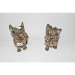 Two brass model terriers