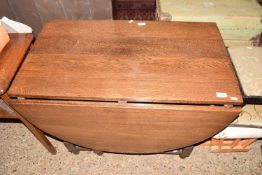 20th Century oak drop leaf dining table