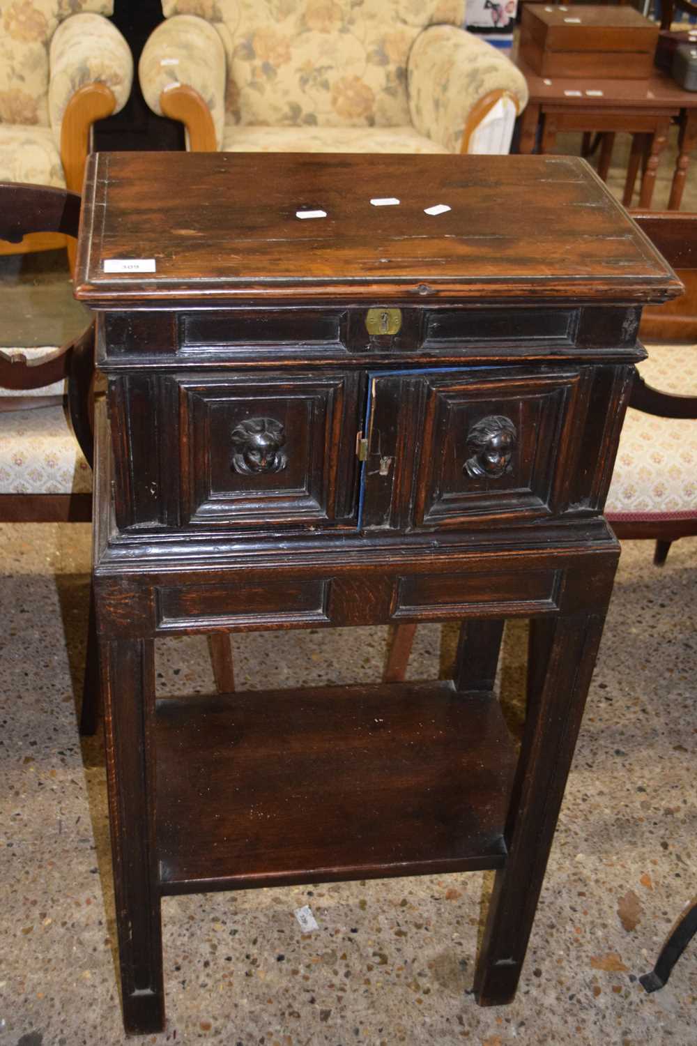Adapted antique cabinet on stand, with lift lid opening to a blue fabric lined interior containing