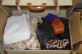 A suitcase of assorted clothing