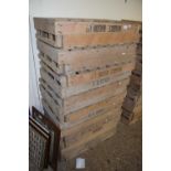 Sixteen vintage wooden apple or potato crates