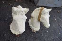 Pair of concrete horses heads