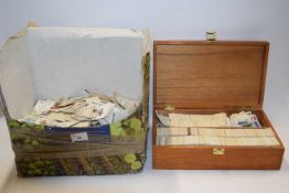 Large box of various loose cigarette and tea cards