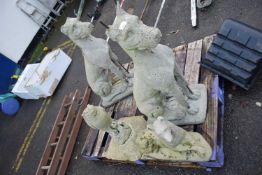 Mixed Lot: Concrete garden ornaments comprising a pair of dogs, an owl and a further smaller dog