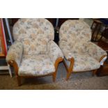Pair of floral upholstered armchairs